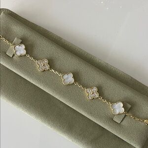 Elegant Gold and White Pearl Clover Bracelet
